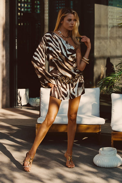 Back view of the zebra print mini dress showing the silhouette and fit.