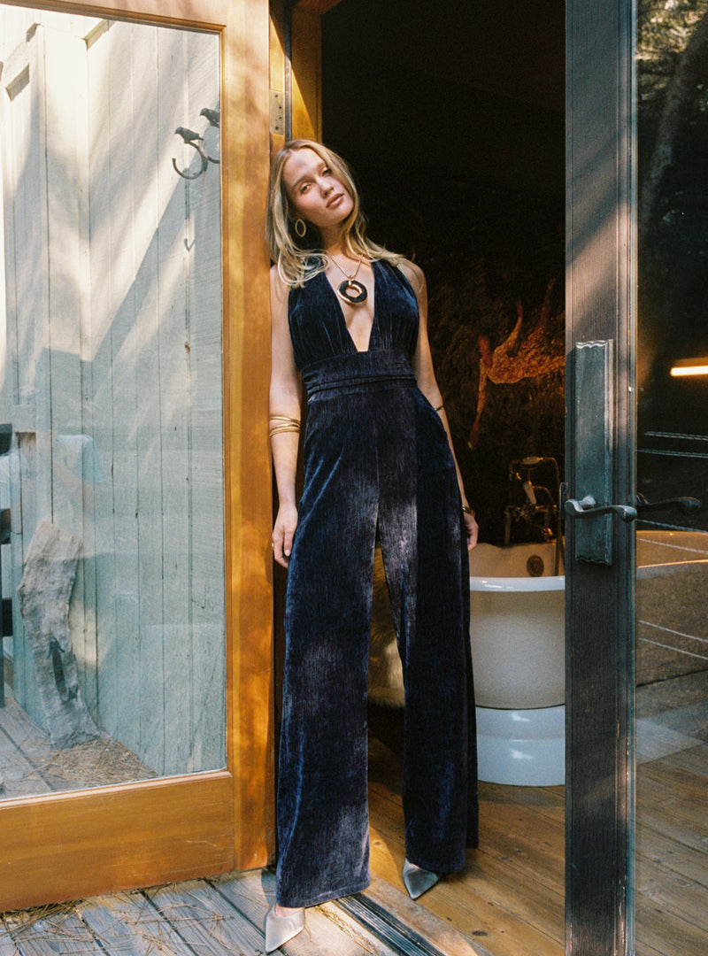Velvet halter jumpsuit with detailing and a flattering silhouette.