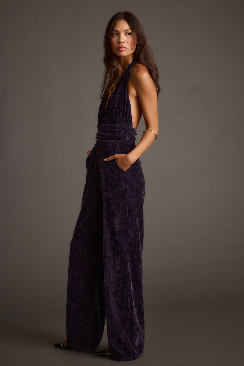 Limelight Midnight Velvet Halter Jumpsuit shown in a complementary styling arrangement.