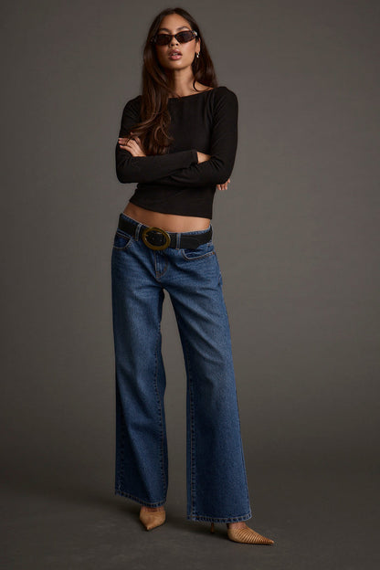 Matti Black Boat Neck Top paired with complementary accessories for a polished look.