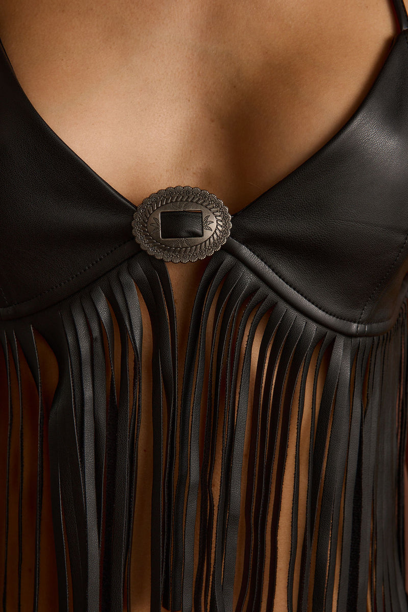 Close-up of the Mesa Black Fringe Bra Top showcasing the fringe texture and craftsmanship.
