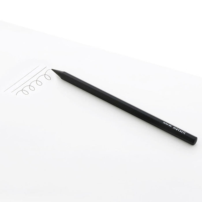 Black pencil on a white background