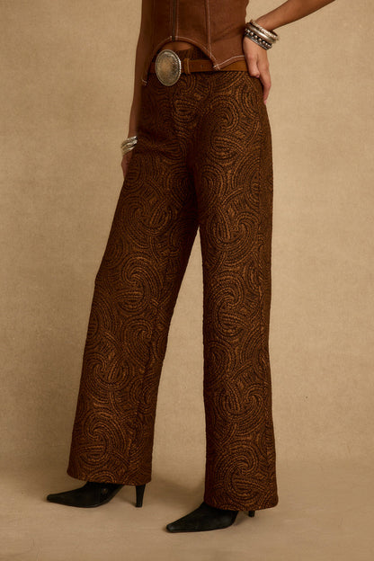 Close-up of the Milan Cognac Swirl Wide Leg Trouser showcasing the fabric texture and design details.