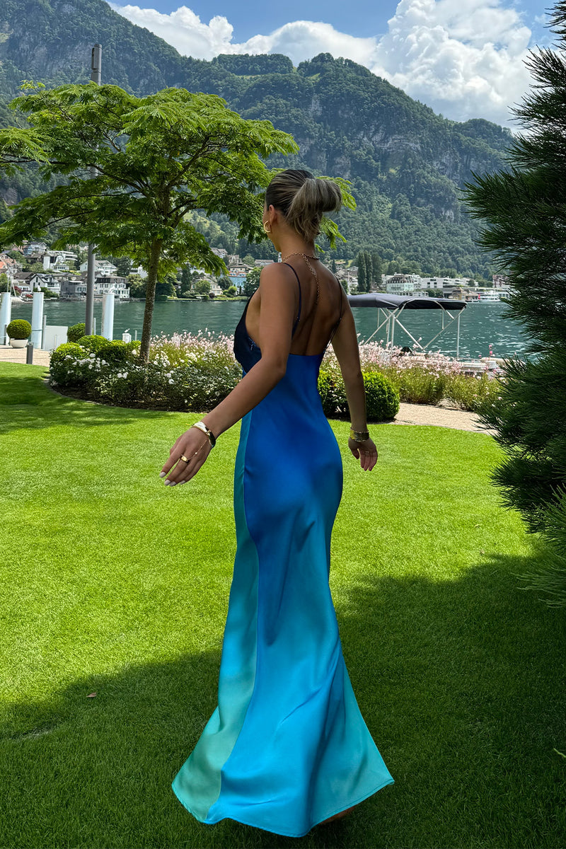 Mirabella Blue Satin Sorbet Maxi Dress paired with complementary accessories for a polished look.