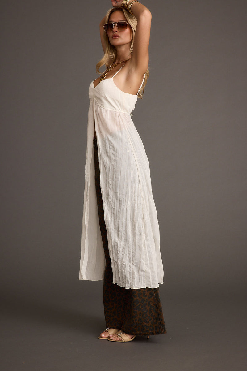 Detail shot of the Mischa Ivory Longline Cami Top highlighting the design elements.