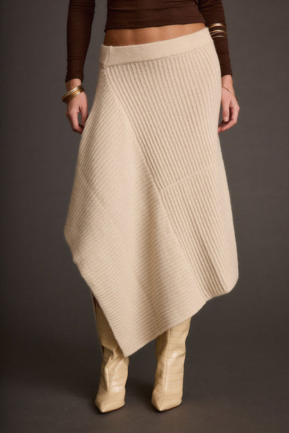 Back view of the cream skirt showing the silhouette and fit.