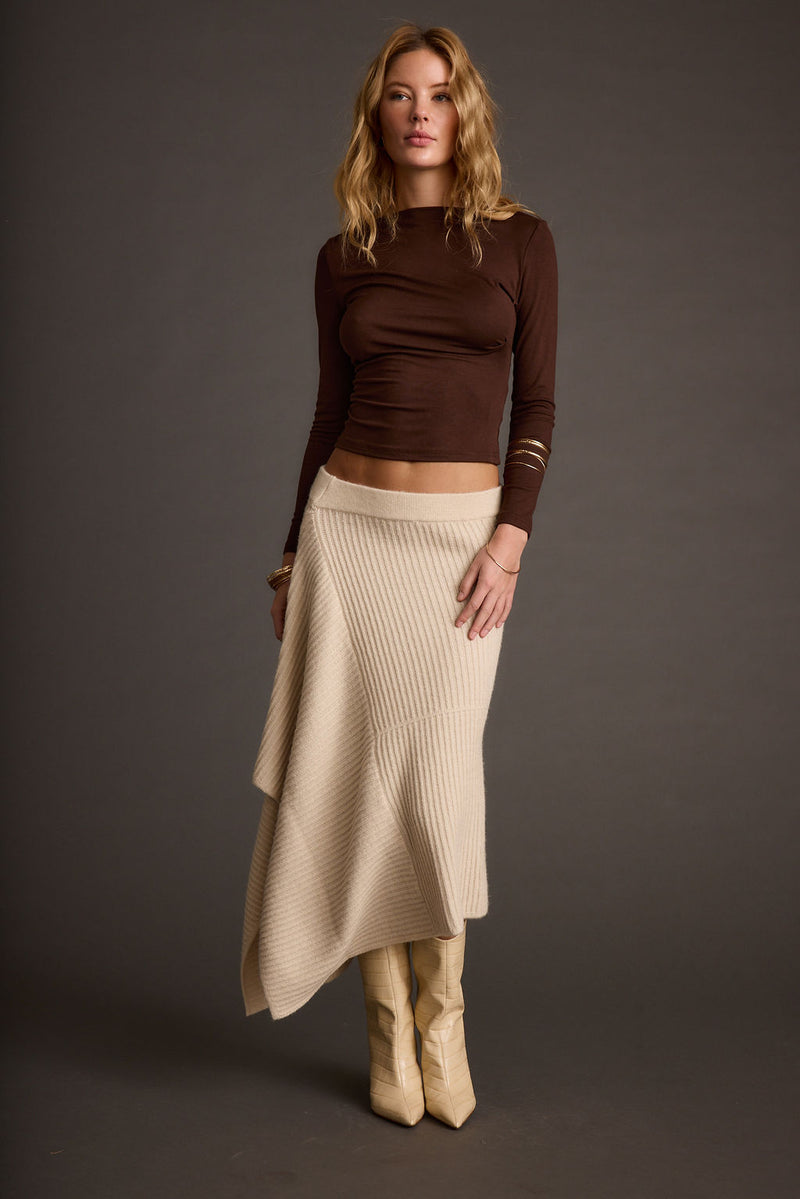 Mod Cream Asymmetrical Skirt styled in a complete look from an alternate angle.