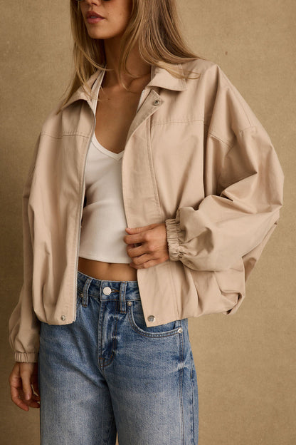 Detail shot of the Monte Khaki Bubble Hem Jacket highlighting the design elements.