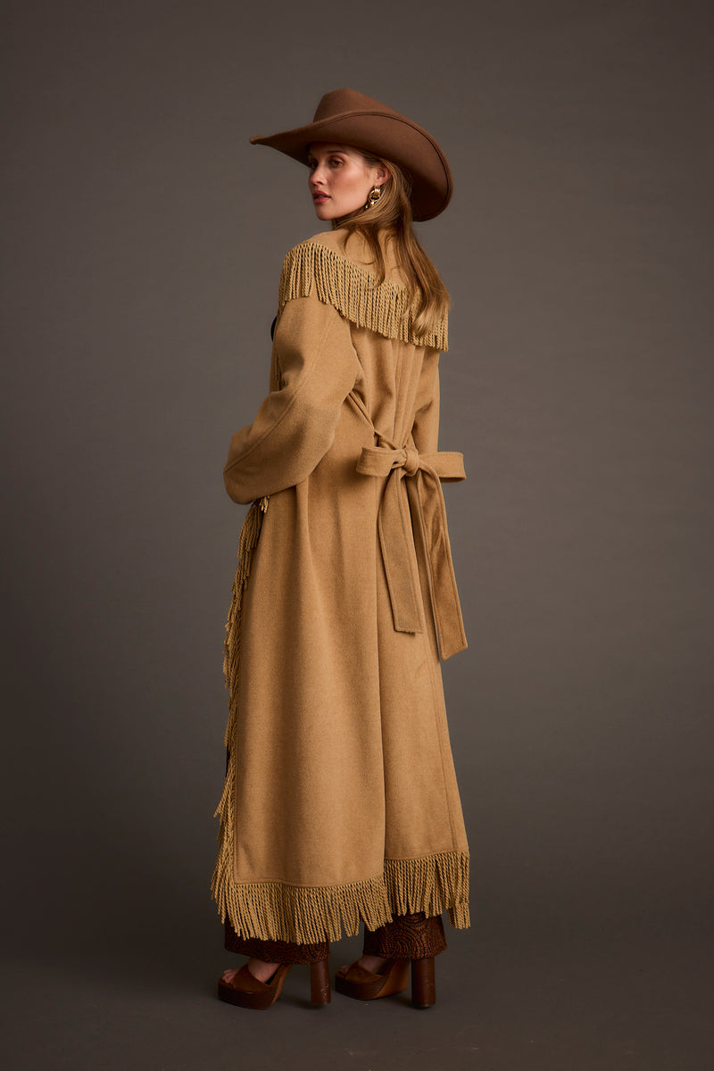 Close-up of the Montrose Camel Fringe Coat showcasing the fringe texture and craftsmanship.