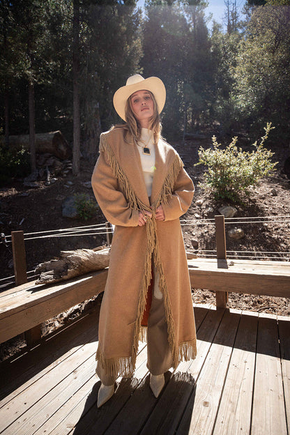 Montrose Camel Fringe Coat styled in a complete look from an alternate angle.