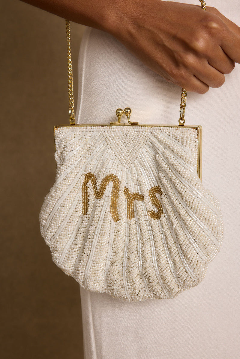 Beaded bag with refined detailing and a flattering silhouette.