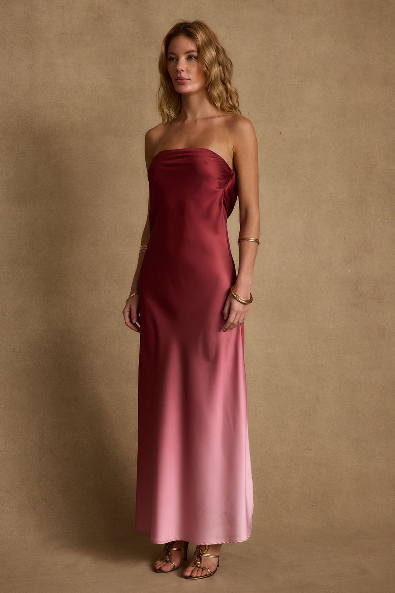 Close-up of the Natalia Strapless Mulberry Ombre Dress showcasing the fabric texture and design details.