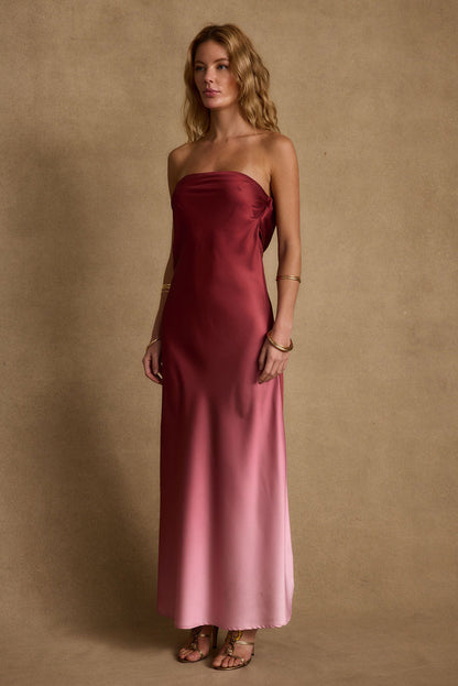 Close-up of the Natalia Strapless Mulberry Ombre Dress showcasing the fabric texture and design details.