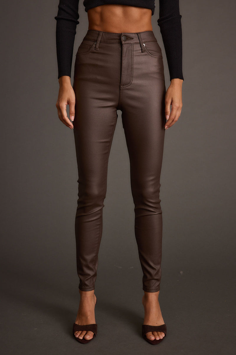 Full-length view of the mocha pants showing the drape and movement.