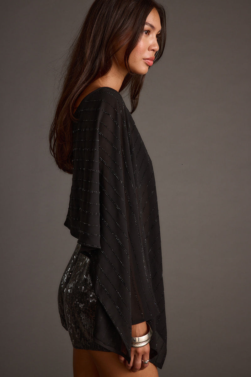 Detail shot of the Oasis Black Rhinestone Shawl highlighting the rhinestone elements.