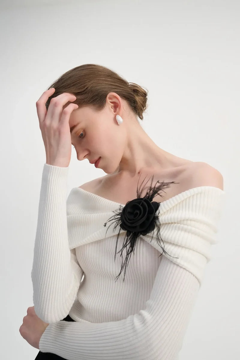 Off-shoulder ribbed knit sweater