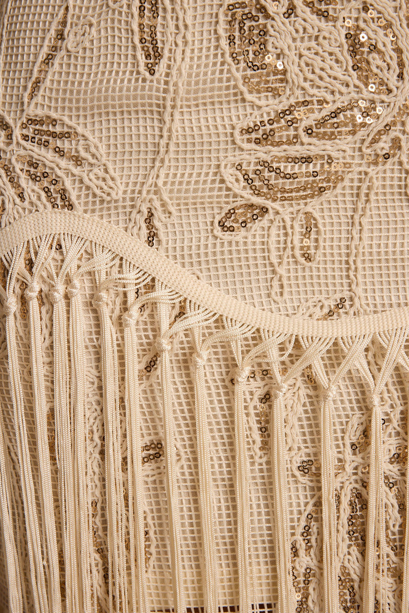 Additional view of the Ophelia Gold Fringe Mini Dress from a different perspective.