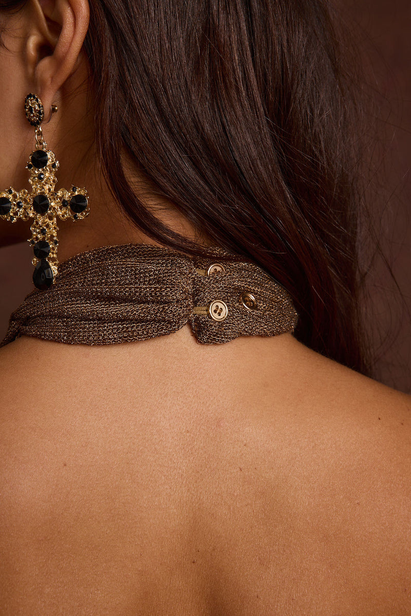 Additional view of the Paloma Bronze Halter Top from a different perspective.