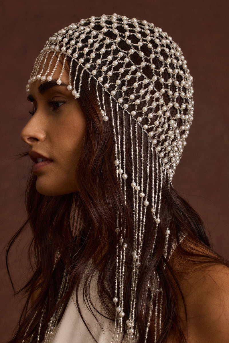 Styling option for the Polina Pearl Headpiece shown with a complementary outfit.