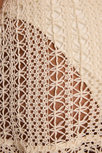 Prairie Wind Natural Crochet Mini Skirt paired with complementary accessories for a polished look.