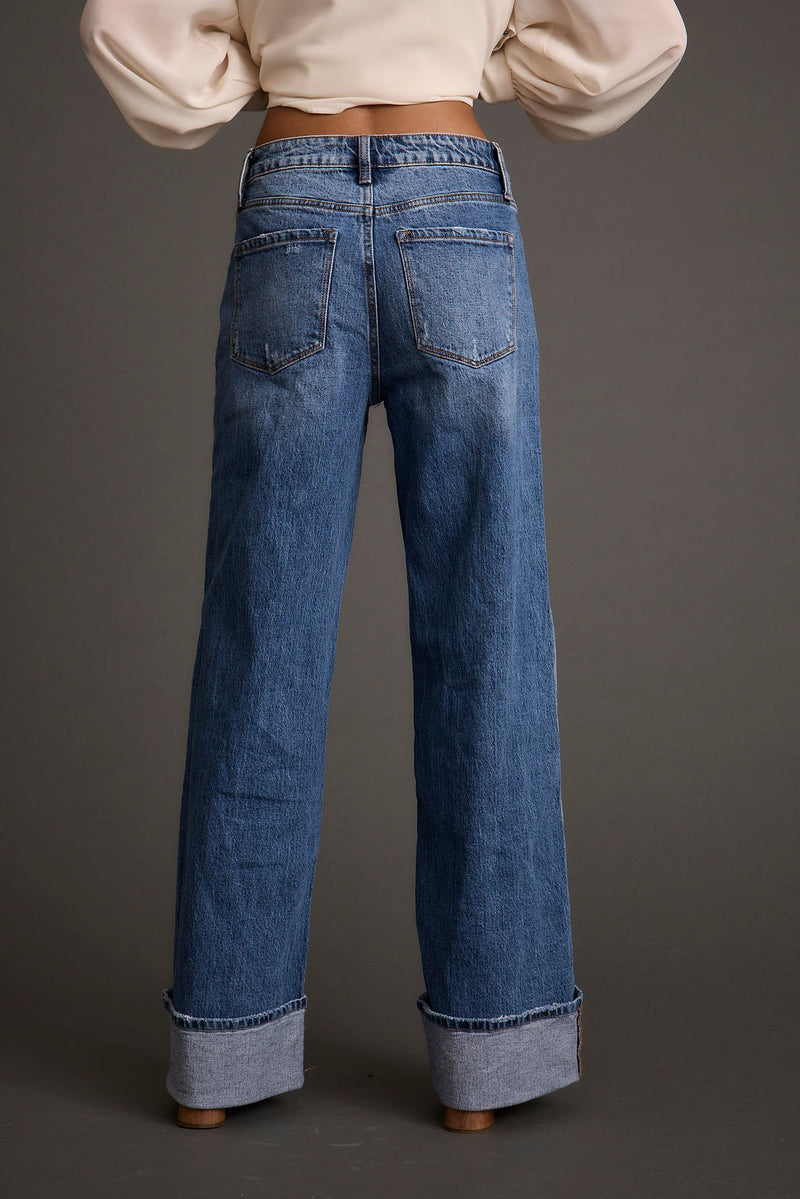 Full-length view of the pants showing the drape and movement.
