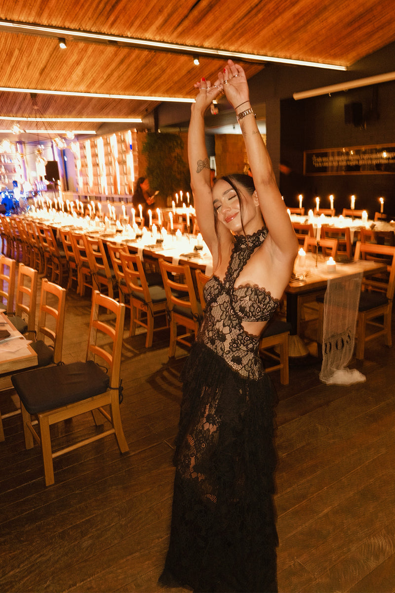 Close-up of the Princesa Black Lace Drop Waist Maxi Dress showcasing the lace texture and craftsmanship.