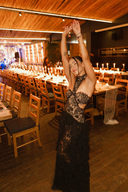 Close-up of the Princesa Black Lace Drop Waist Maxi Dress showcasing the lace texture and craftsmanship.