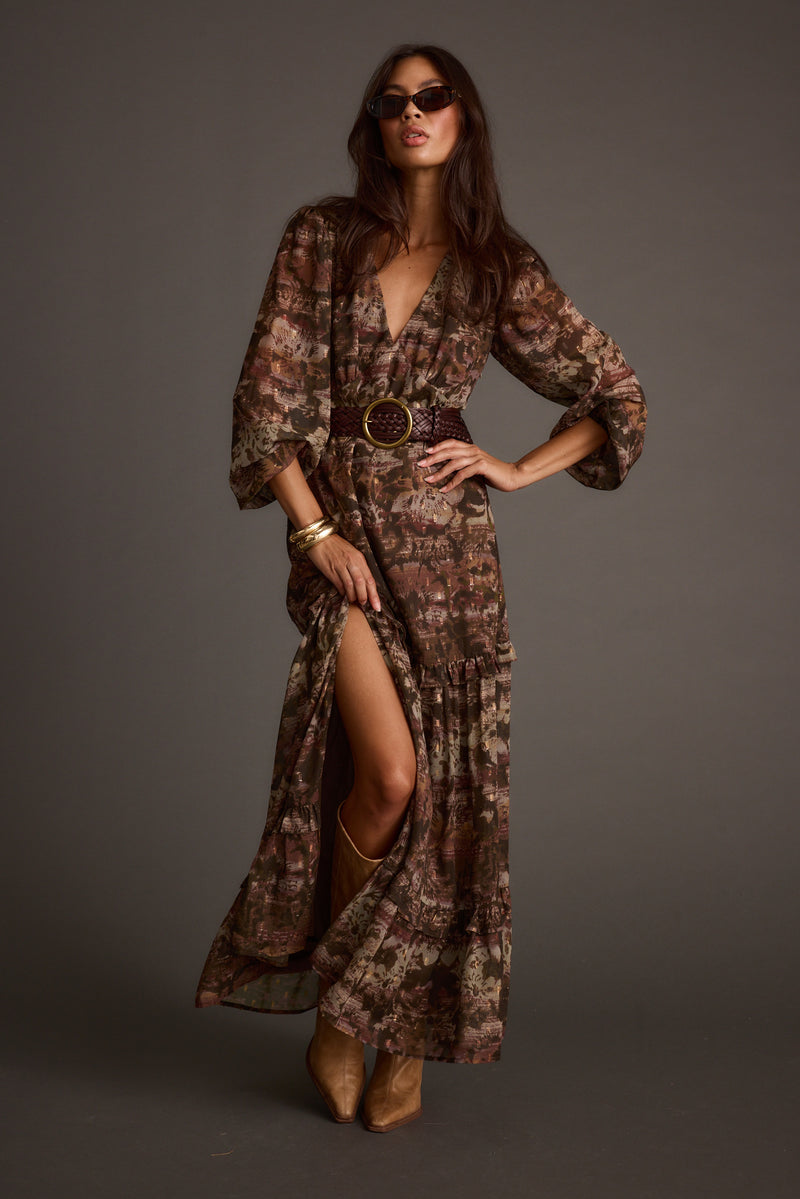 Floral maxi dress with elegant accents, a vacation maxi dress essential.