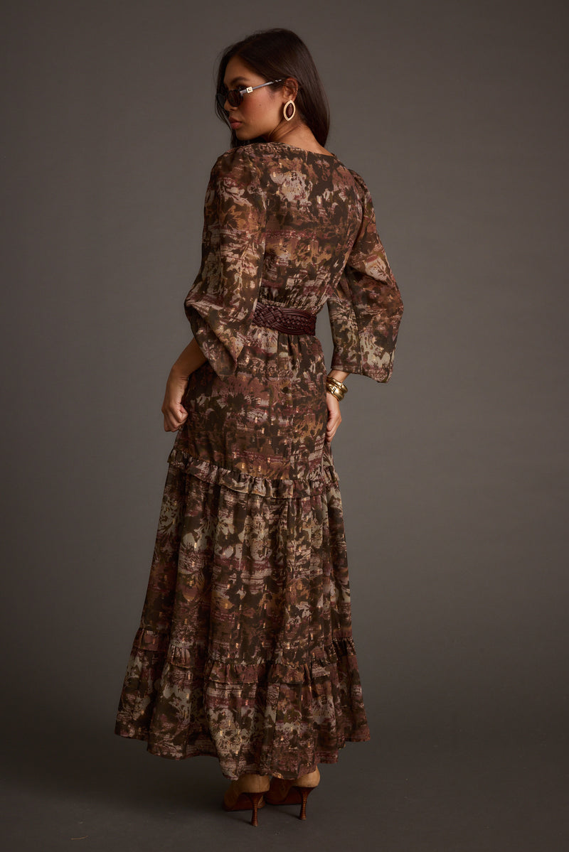 Back view of the floral maxi dress showing the silhouette and fit.