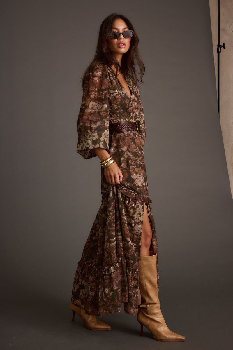 Close-up of the Raindance Floral Long Sleeved Maxi Dress showcasing the fabric texture and design details.
