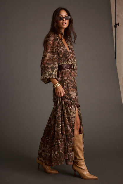 Close-up of the Raindance Floral Long Sleeved Maxi Dress showcasing the fabric texture and design details.