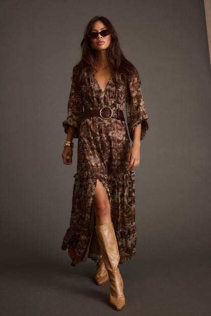 Detail shot of the Raindance Floral Long Sleeved Maxi Dress highlighting the design elements.