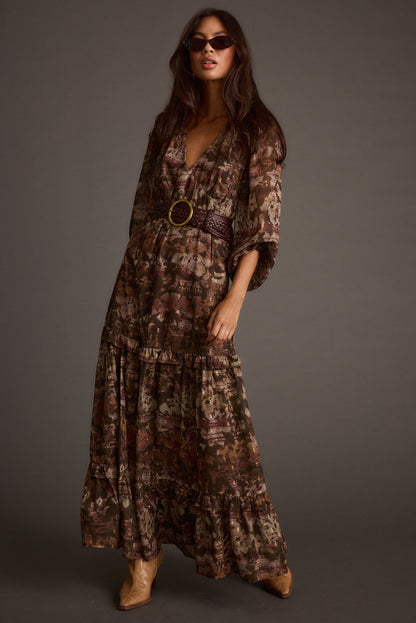 Lifestyle shot of the floral maxi dress styled for day-to-night versatility.