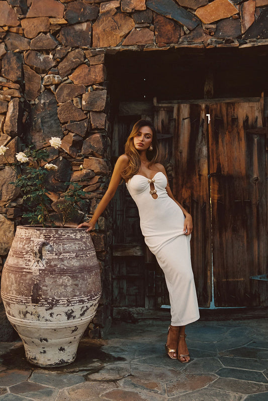 White maxi dress with elegant accents, a white sequin dress essential.