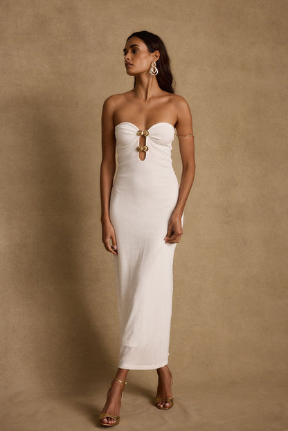 Back view of the white maxi dress showing the silhouette and fit.