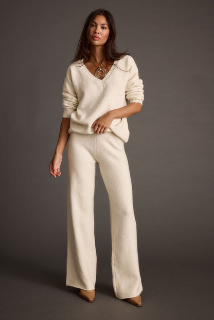 Close-up of the Robbyn Ivory Sweater showcasing the fabric texture and design details.
