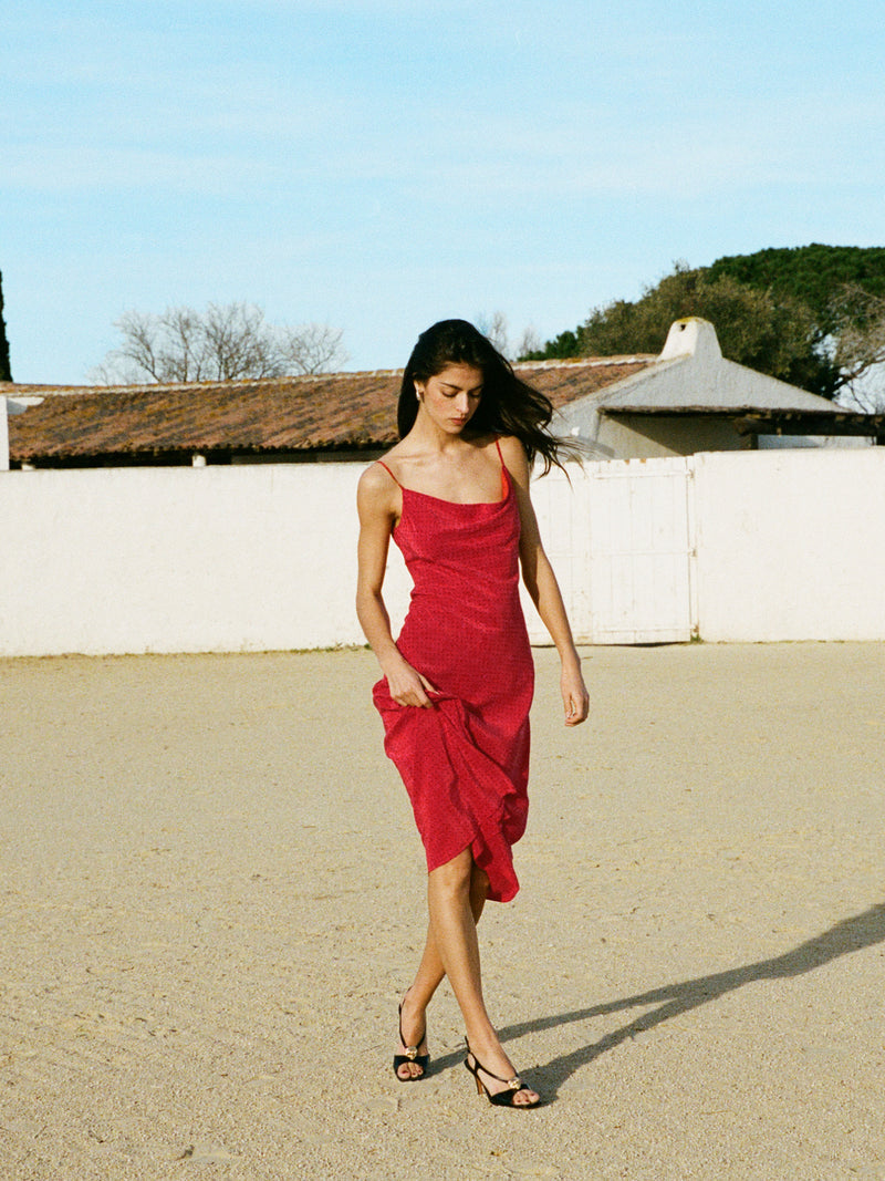 GEMMA red plumetis long cowl-neck dress, lifestyle setting by Rouje