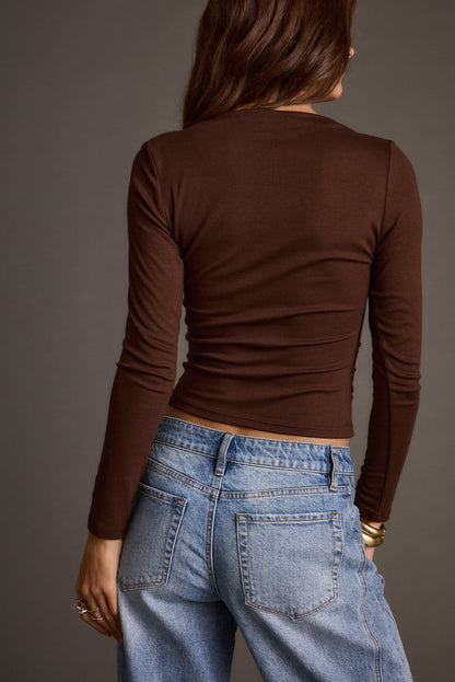 Close-up of the Romy Espresso Top showcasing the fabric texture and design details.