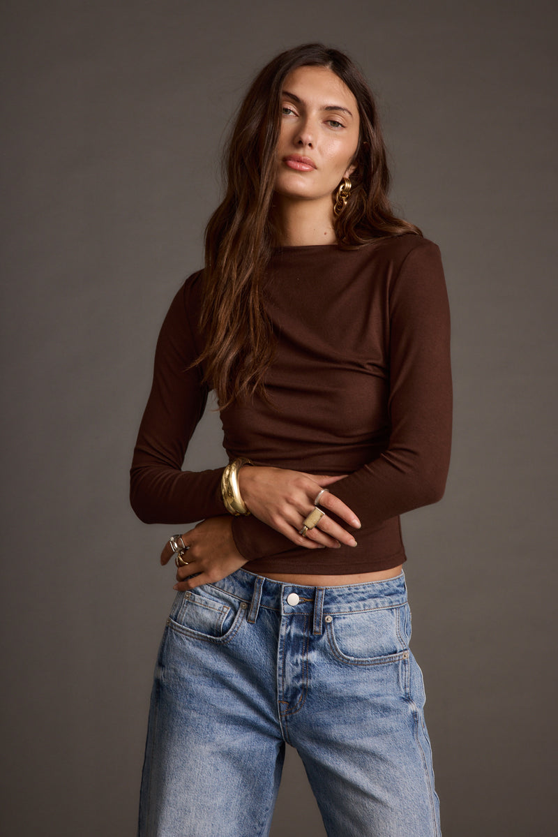 Detail shot of the Romy Espresso Top highlighting the design elements.