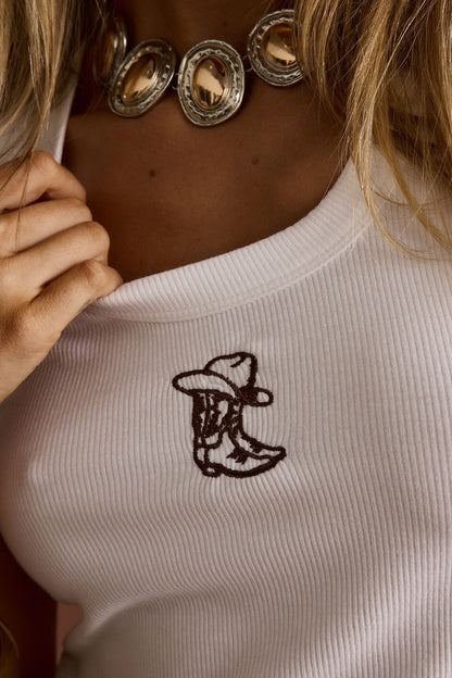 Back view of the embroidered piece showing the silhouette and fit.
