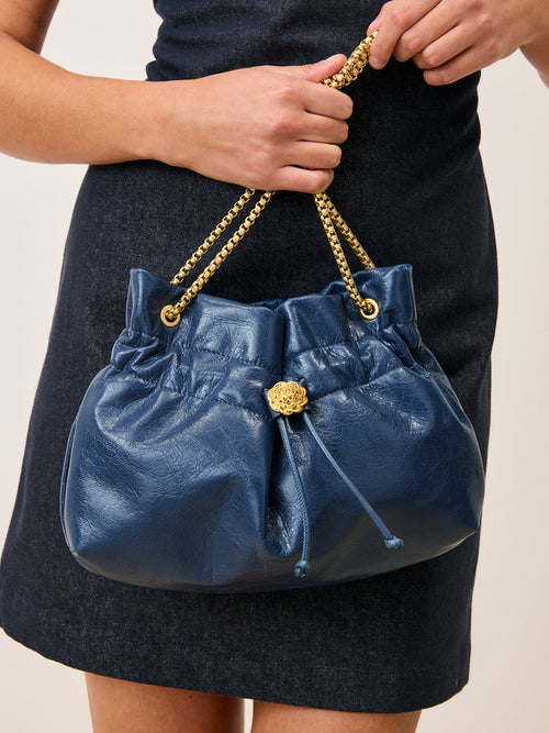 ANISETTE denim-effect leather small bucket bag, front view by Rouje