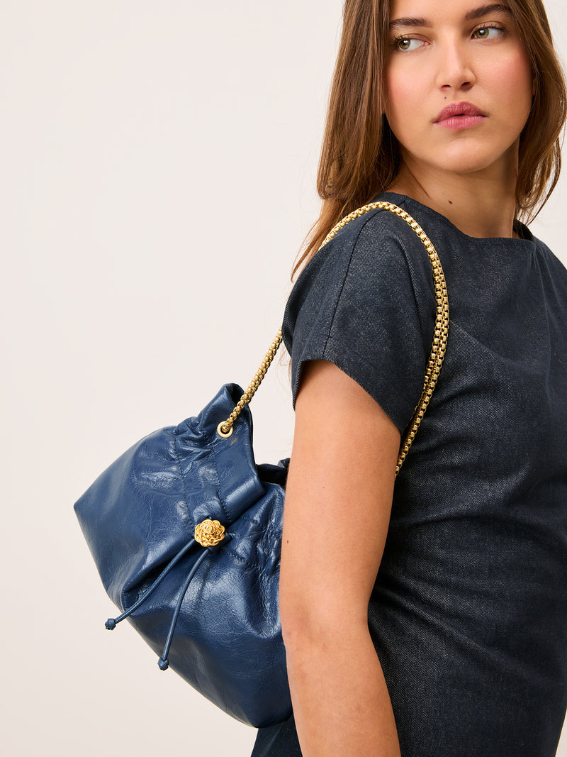 ANISETTE denim-effect leather bucket bag, back view by Rouje
