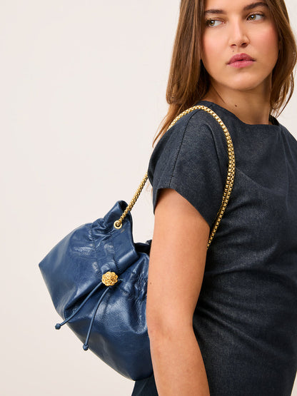 ANISETTE denim-effect leather bucket bag, back view by Rouje