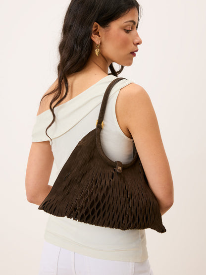 CHOUQUETTE ebony laser-cut leather bag, detail of mesh pouch by Rouje