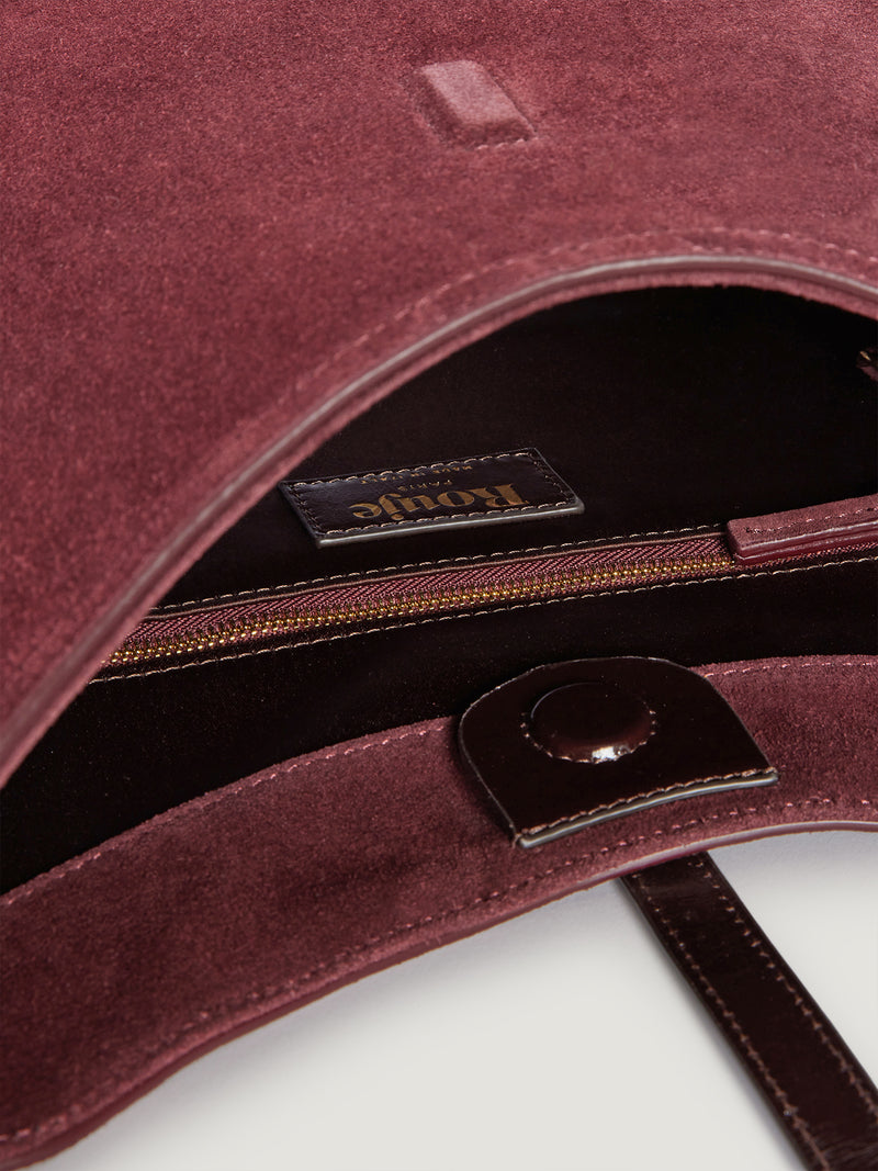 COMPTOIR plum calfskin messenger bag, detail of glazed leather handle by Rouje