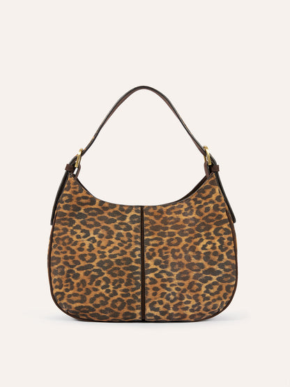 FRENCHY leopard print leather bag worn on a model by Rouje