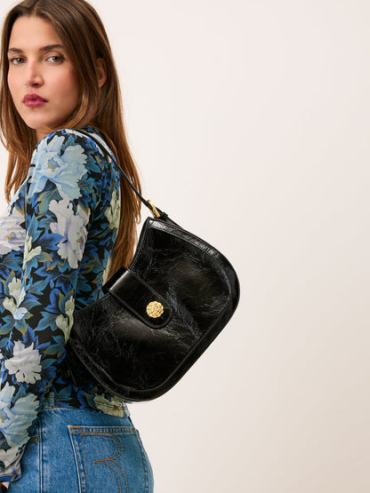 GALA black glossy leather bag worn on a model by Rouje