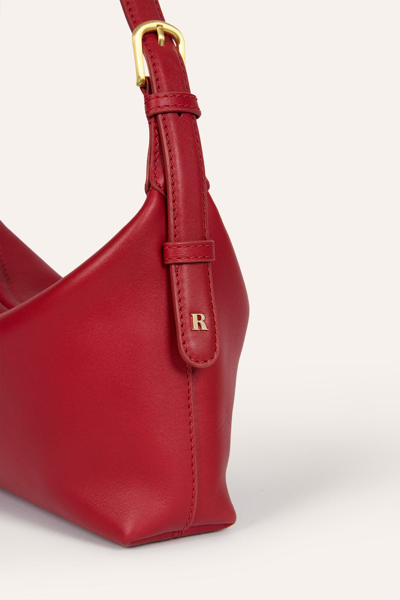 MINUIT red leather soft bag, detail of gold R logo by Rouje