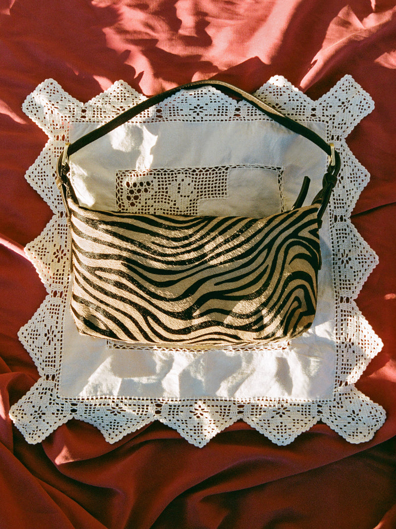 MINUIT zebra pony soft bag, lifestyle setting by Rouje
