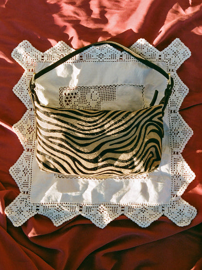MINUIT zebra pony soft bag, lifestyle setting by Rouje